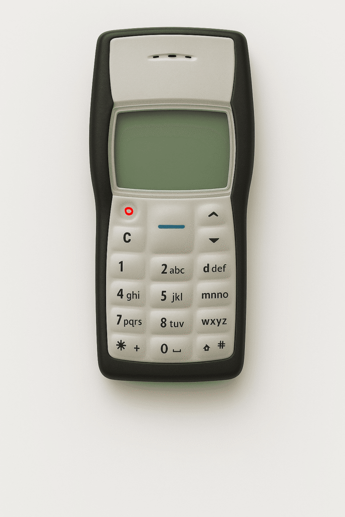 Nokia 1100 de frente mostrando su teclado y pantalla monocromática, el celular más vendido de la historia con diseño duradero y simple